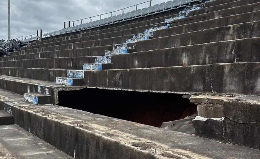 a sinkhole uncovering a rumored moonshine cave beneath a NASCAR speedway